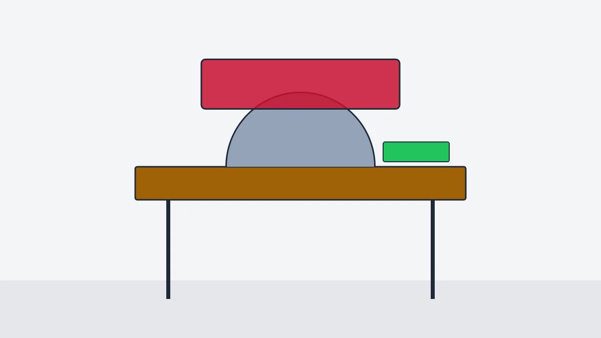 Table saw with a hood guard over the blade and a push stick